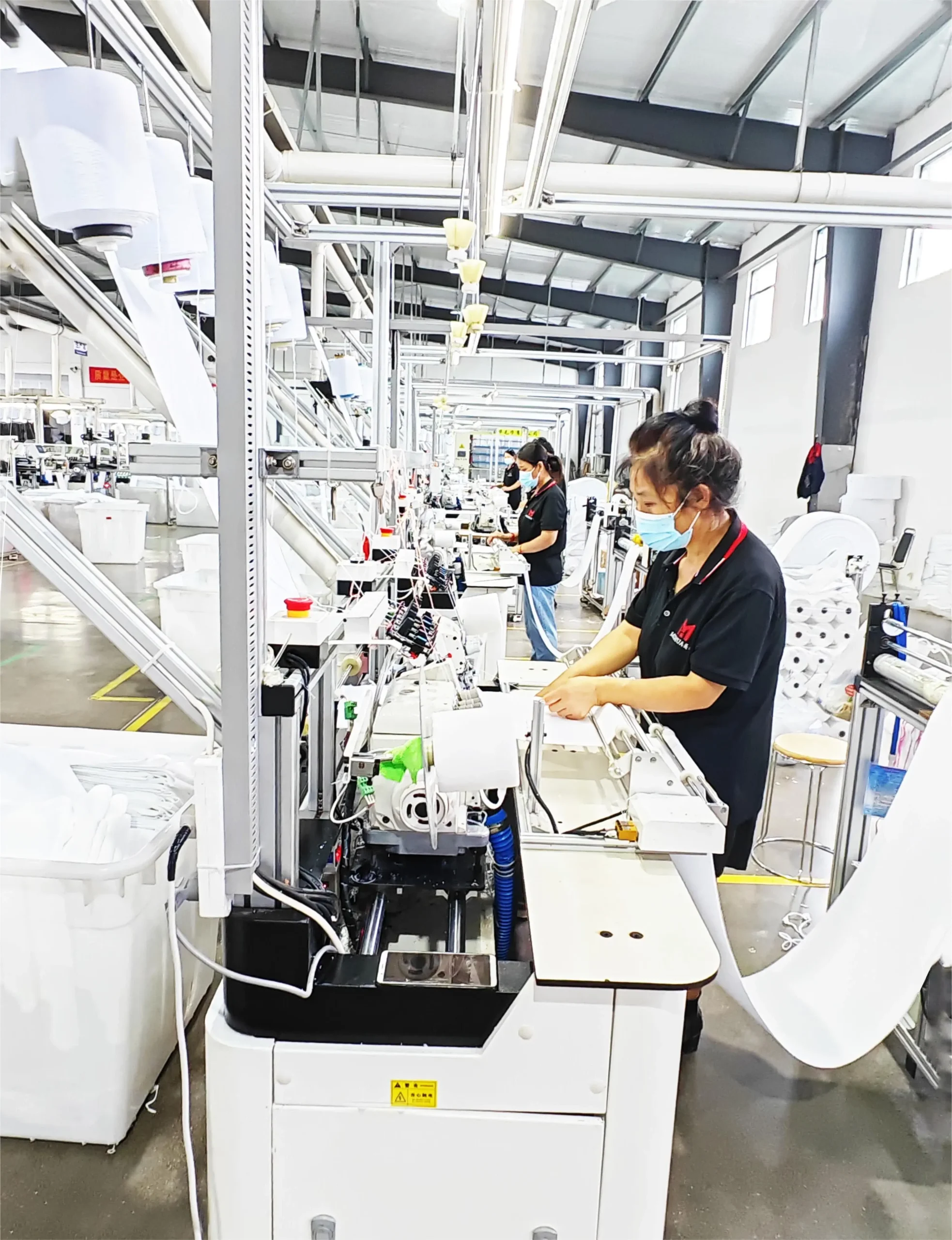 Textile manufacturing machinery